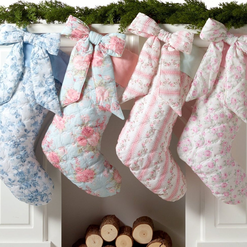 Quilted Maisie Bow Christmas Stocking shown alongside other designs in the same collection, 15x25 inch