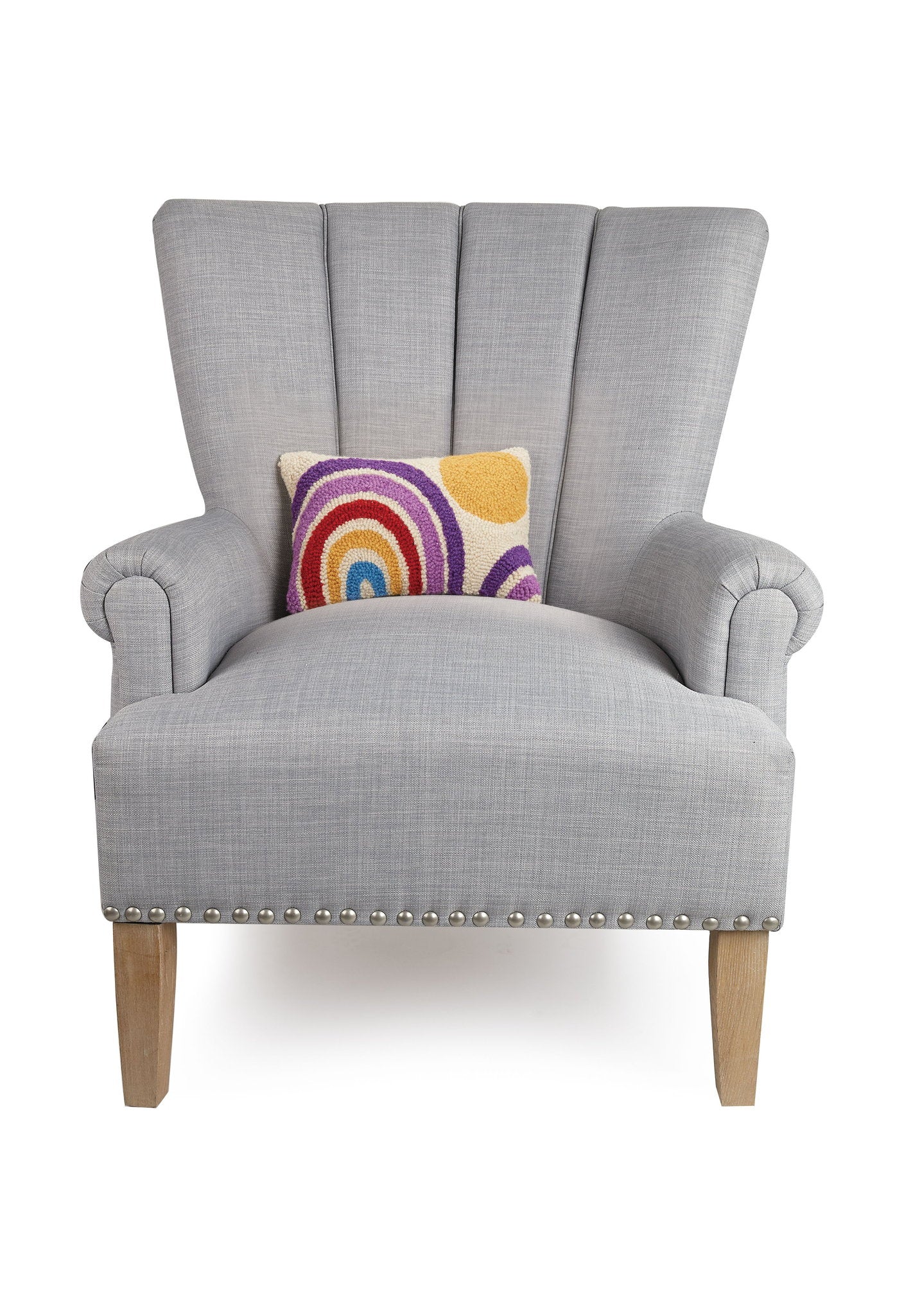 Rainbow and Sun Hooked Wool Throw Pillow on an armchair, showing the throw pillow at room scale, 8x12 inch
