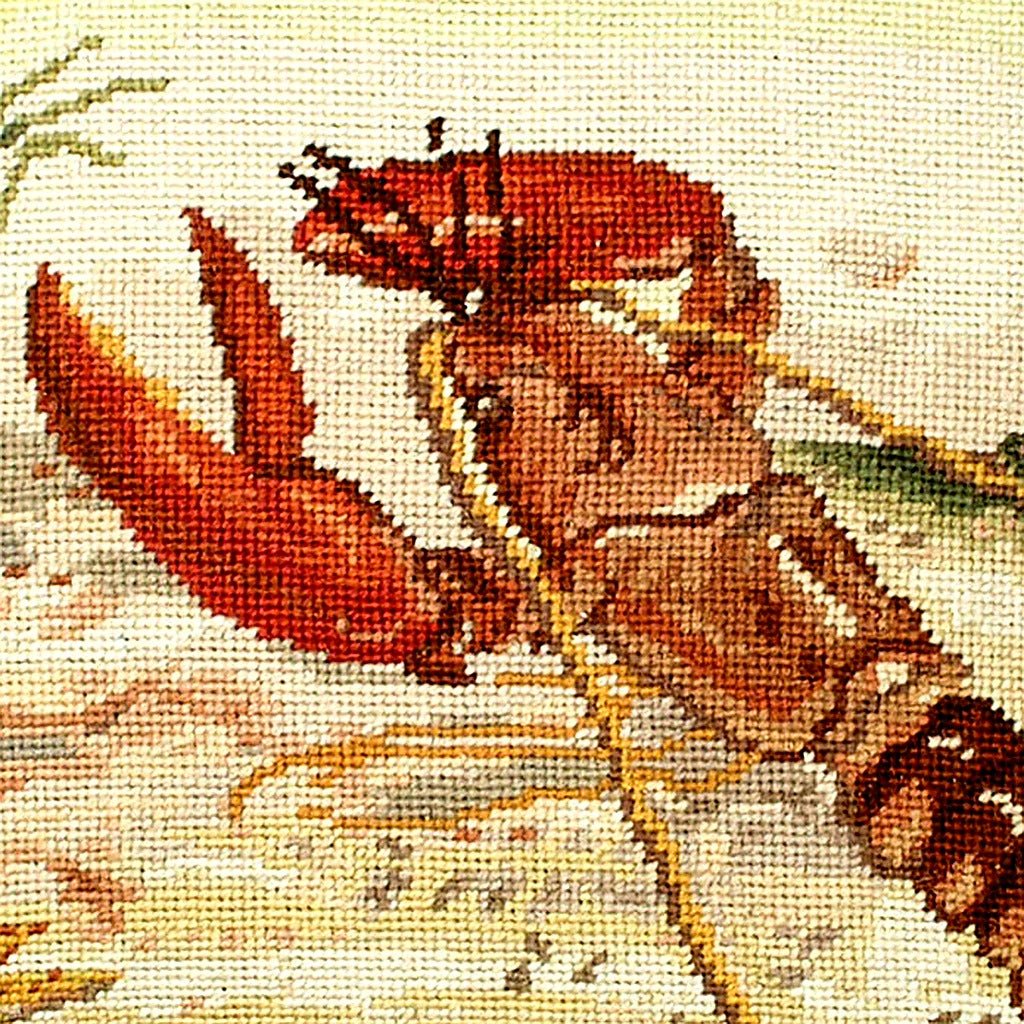 Closeup of Red Lobster Coastal needlepoint throw pillow highlighting hand-stitched wool craftsmanship and fabric detail