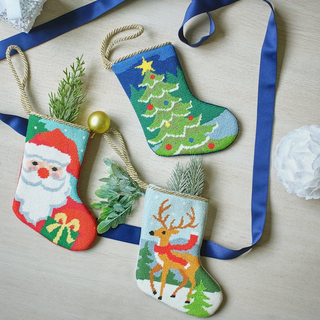 Reindeer Mini Embroidered Needlepoint Christmas Stocking, 6x4 inch, three mini stockings on blue ribbon with greenery