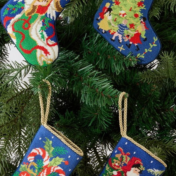 Santa with Gift Mini Embroidered Needlepoint Christmas Stocking shown alongside other designs in the same collection, 6x4 inch