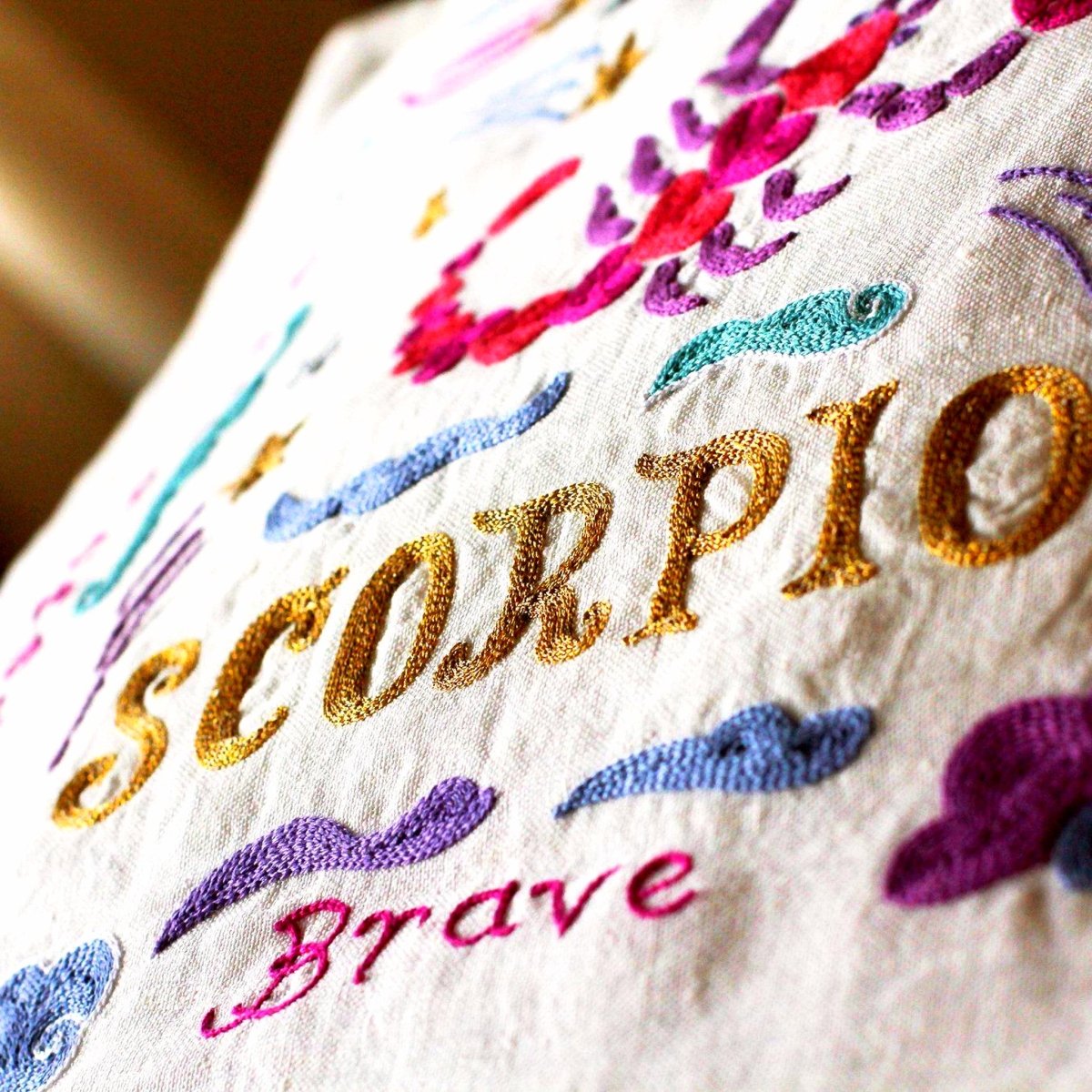 Scorpio Astrology Zodiac Embroidered Throw Pillow - close-up detail of hand-embroidered needlepoint stitching