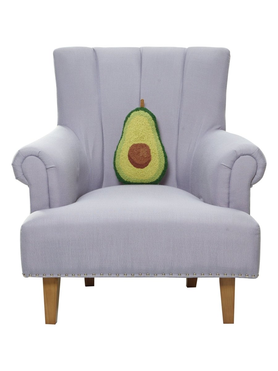 Shaped Avocado Hooked Wool Throw Pillow on an armchair, showing the throw pillow at room scale, 8x12 inch