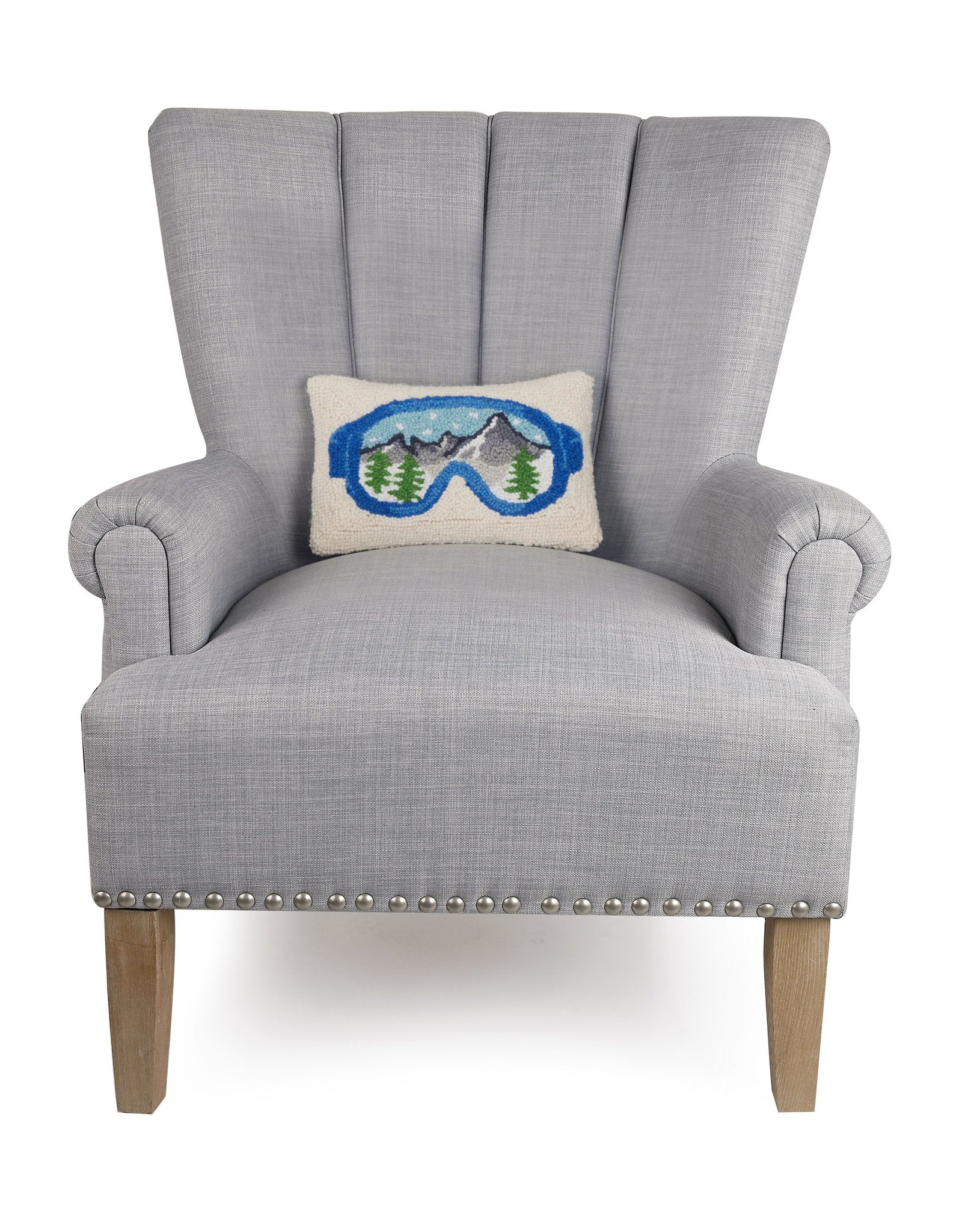 Ski Goggles Hooked Wool Christmas Throw Pillow on an armchair, showing the throw pillow at room scale, 8x12 inch