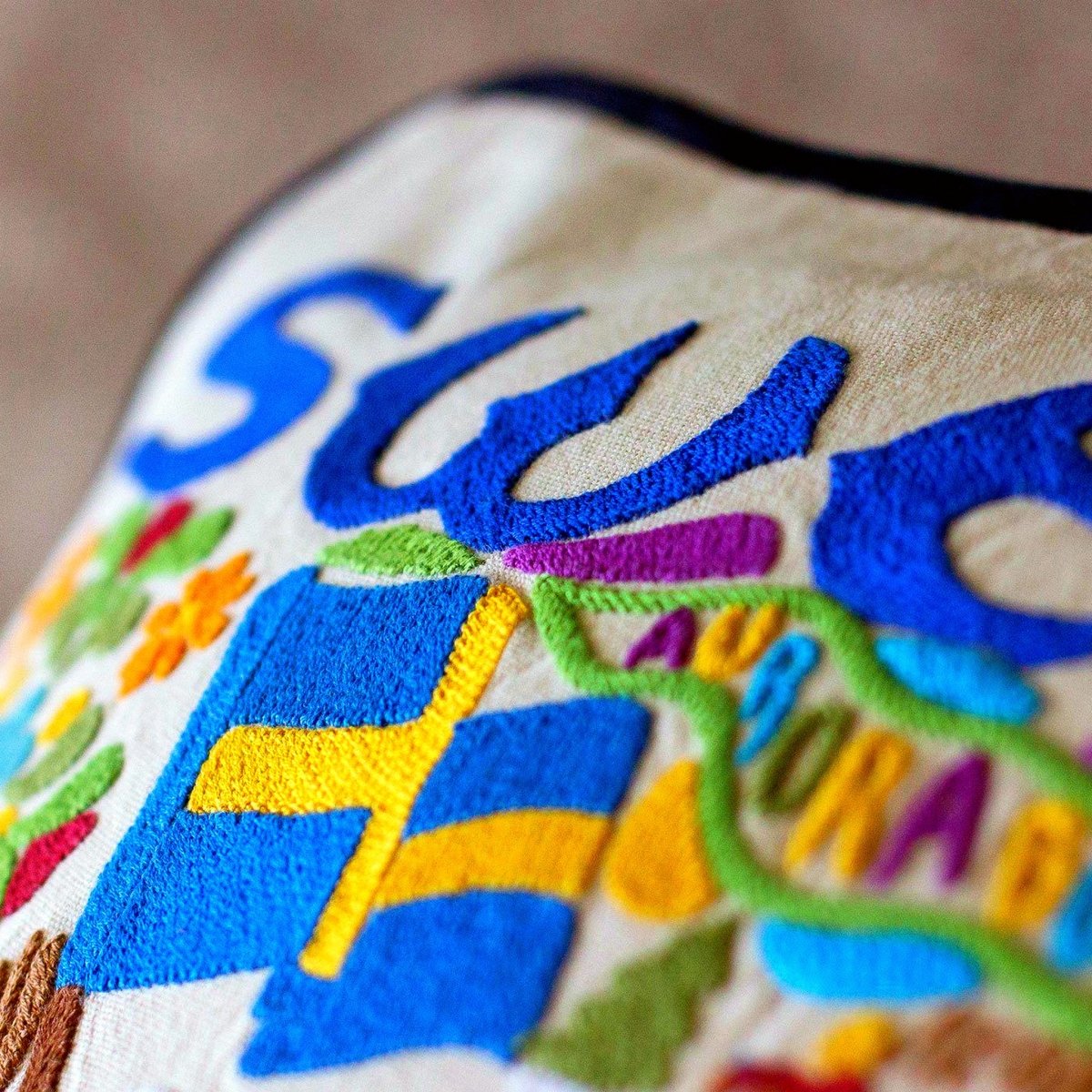 Sweden Lapland Northern Lights Embroidered Pillow - close-up detail of hand-embroidered needlepoint stitching