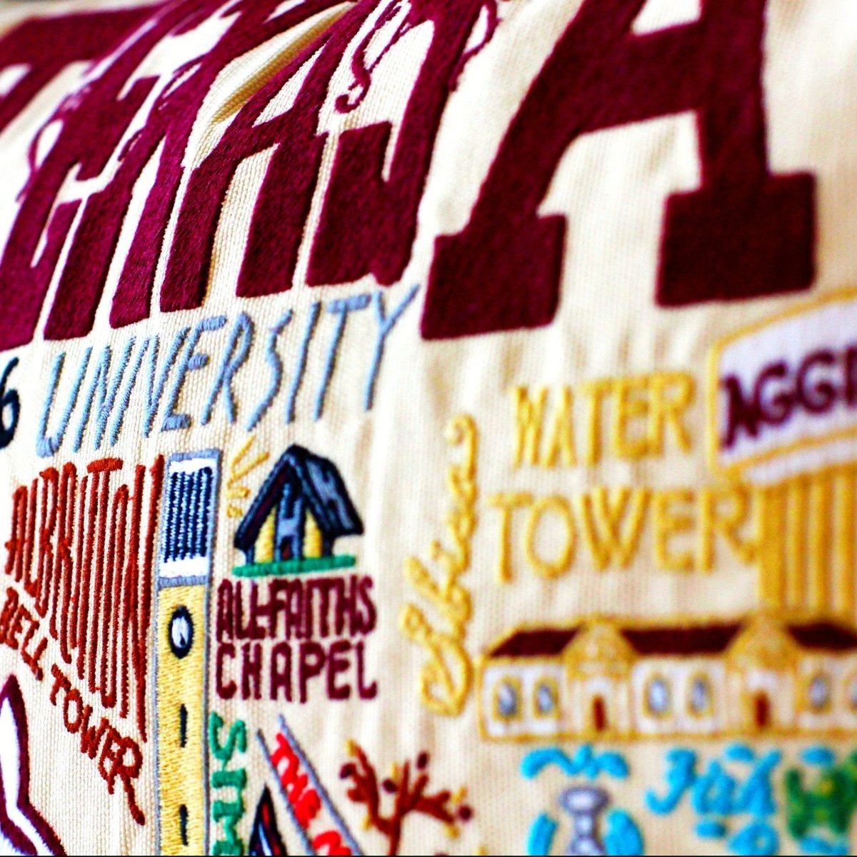 Texas A&M University Aggies Embroidered College Pillow - close-up detail of hand-embroidered needlepoint stitching