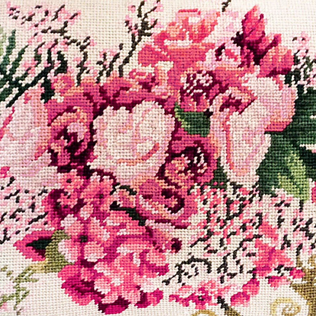 Closeup of Traditional Red Green Botanical needlepoint throw pillow highlighting hand-stitched wool craftsmanship and fabric detail