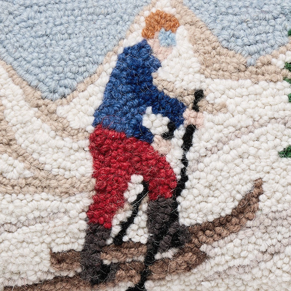 Uphill Skier Hooked Wool Christmas Throw Pillow, close-up detail