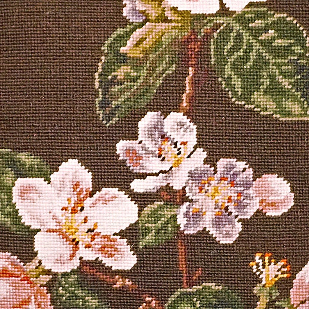 Closeup of Vintage Apple Blossom needlepoint throw pillow highlighting hand-stitched wool craftsmanship and fabric detail