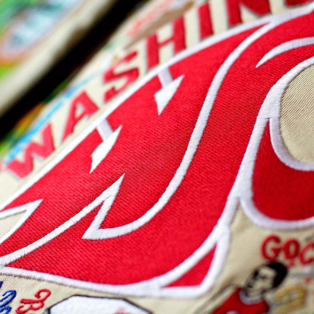 Washington State University Cougars Embroidered Throw Pillow - close-up detail of hand-embroidered needlepoint stitching