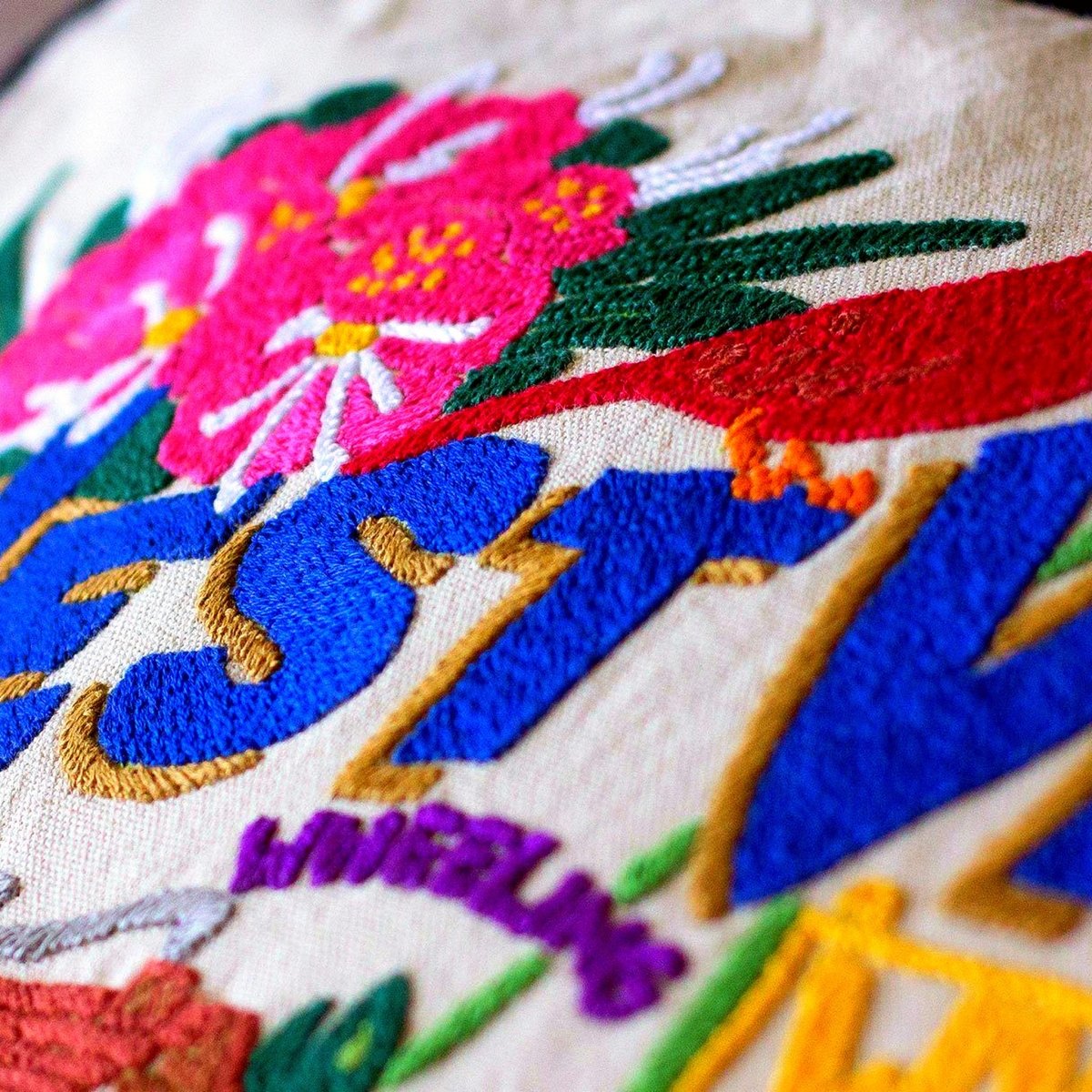 West Virginia State Mountain Travel Embroidered Throw Pillow - close-up detail of hand-embroidered needlepoint stitching