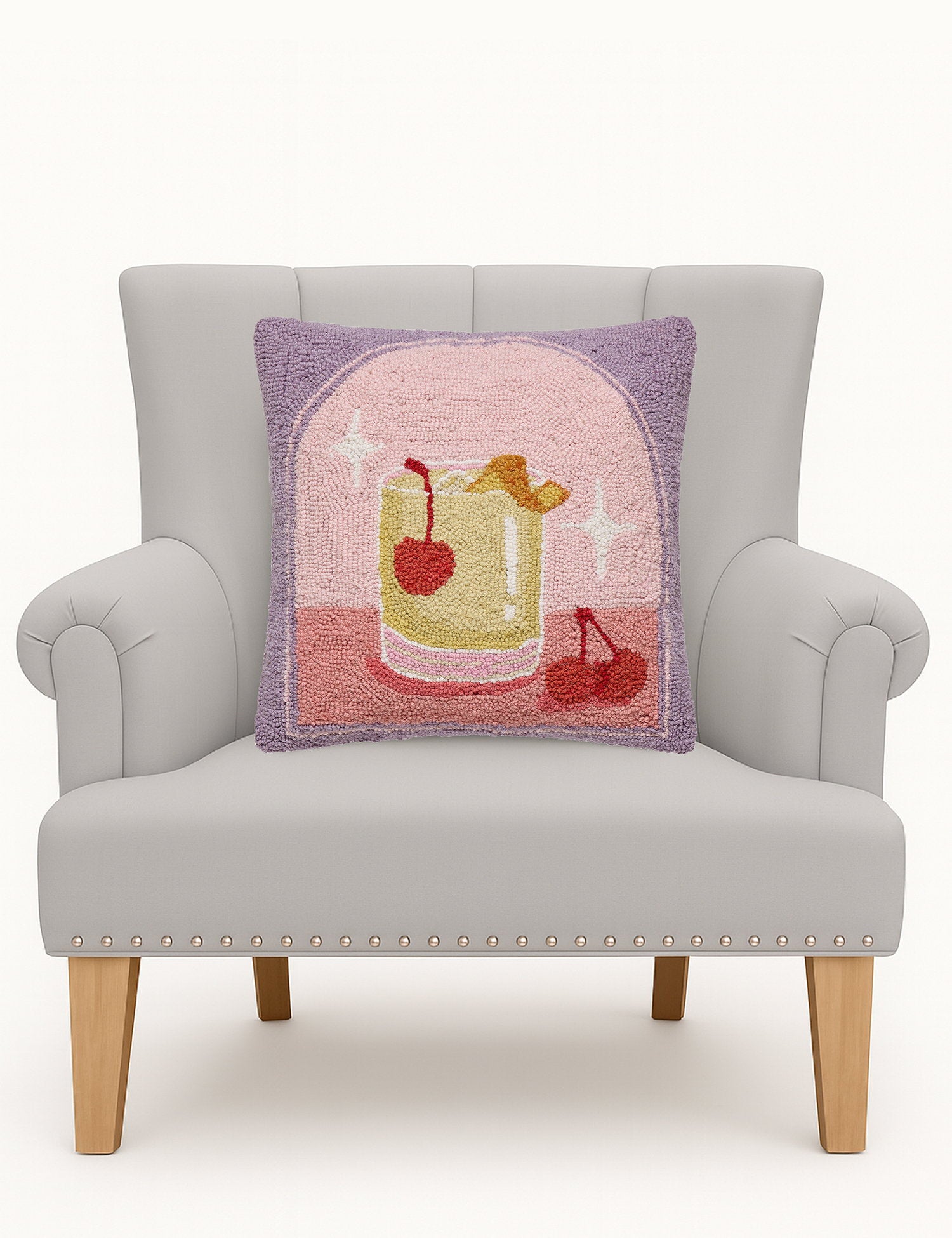 Whiskey Sour Hooked Wool Throw Pillow on an armchair, showing the throw pillow at room scale, 16x16 inch