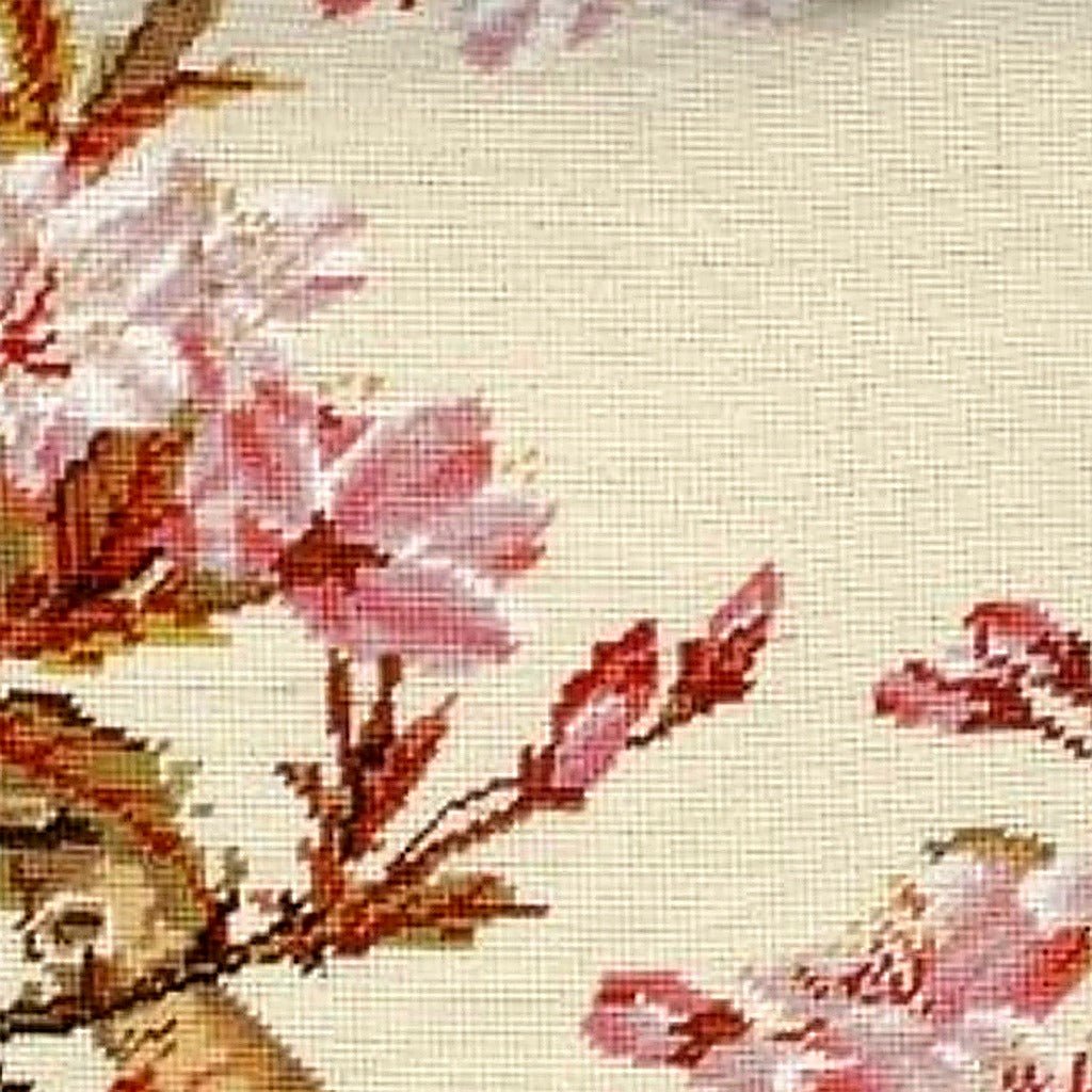 Closeup of White Cherry Blossom needlepoint throw pillow highlighting hand-stitched wool craftsmanship and fabric detail