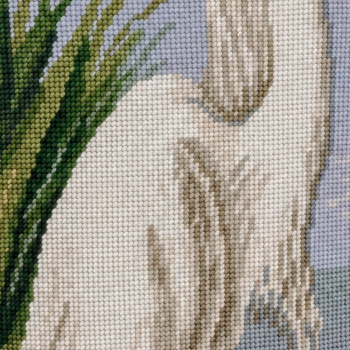 Close-up stitch detail of the White Egret Colonial Williamsburg needlepoint pillow showing wool texture