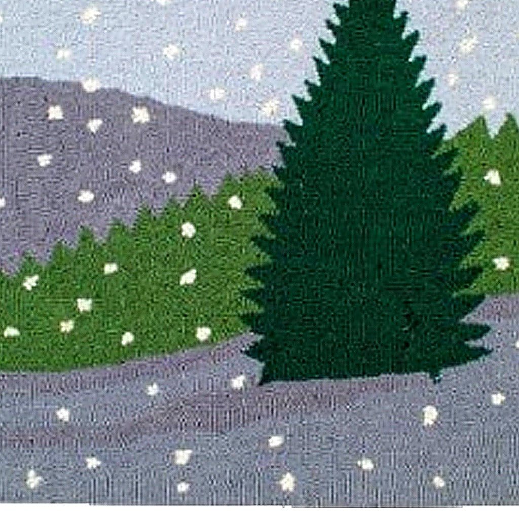 Closeup of Winter Evergreen Tree Travel needlepoint rug highlighting hand-tufted wool craftsmanship and design detail