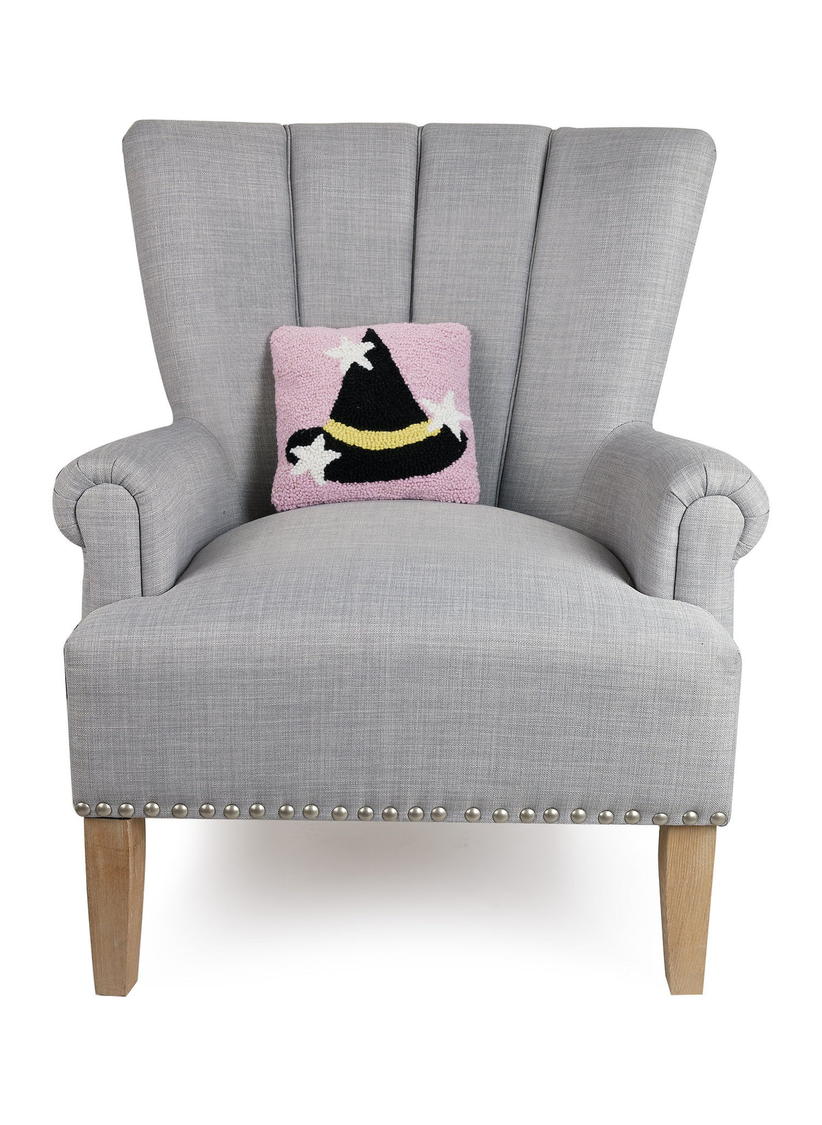 Witch Hat with Stars Hooked Wool Halloween Throw Pillow on an armchair, showing the throw pillow at room scale, 10x10 inch