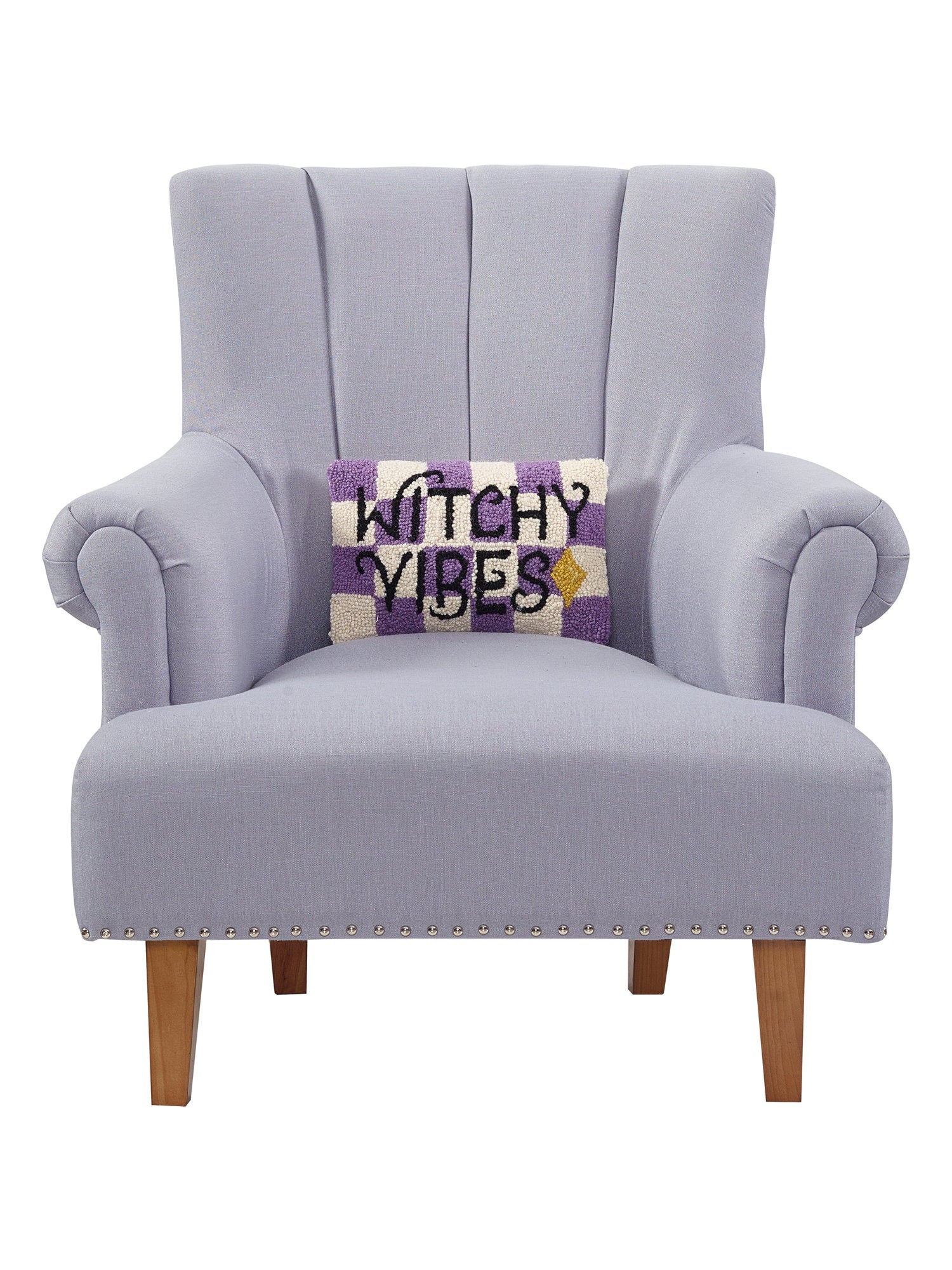 Witchy Vibes Hooked Wool Halloween Throw Pillow on an armchair, showing the throw pillow at room scale, 8x12 inch