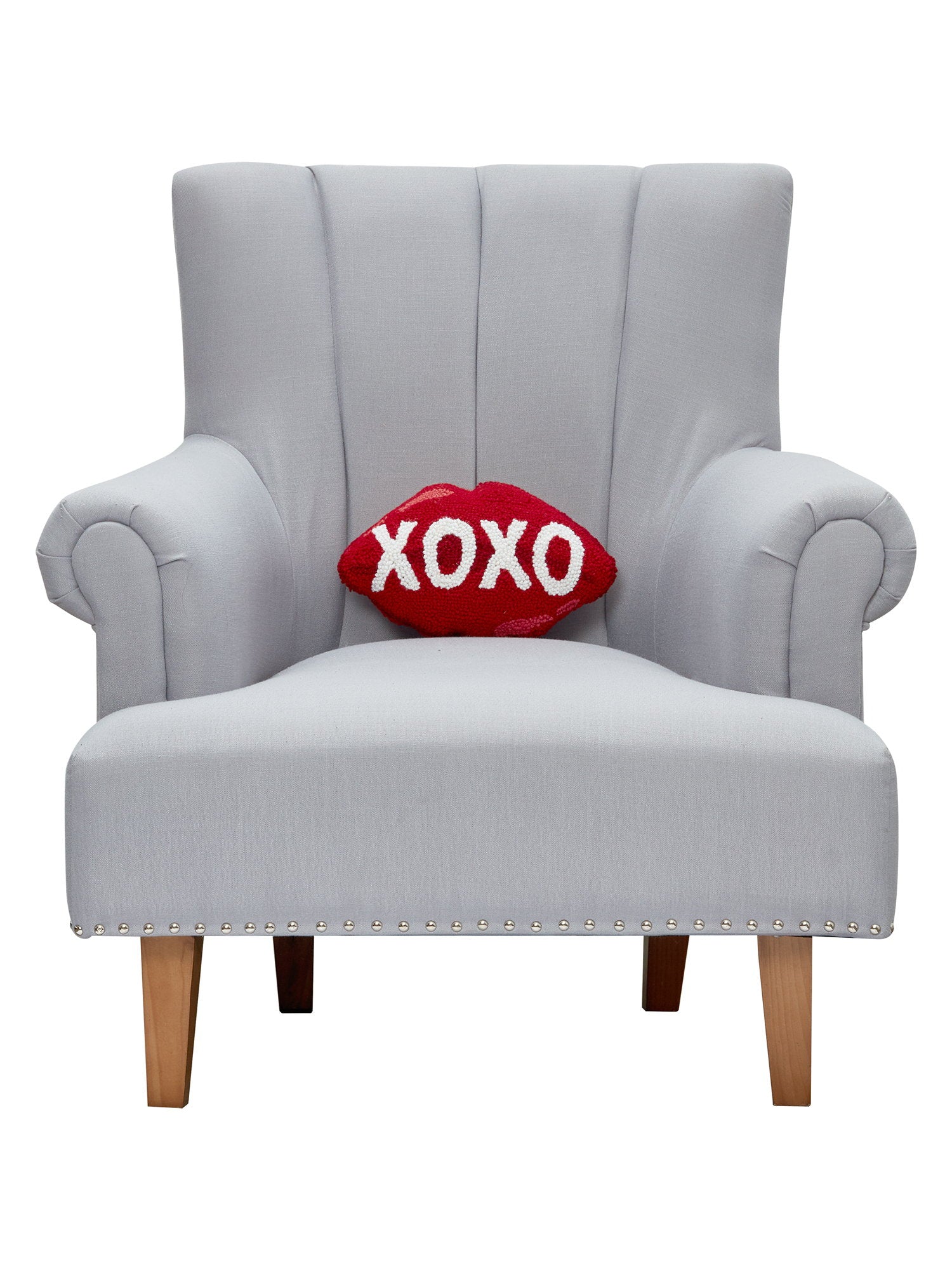 Xoxo Hooked Wool Valentine Throw Pillow on an armchair, showing the throw pillow at room scale, 8x12 inch