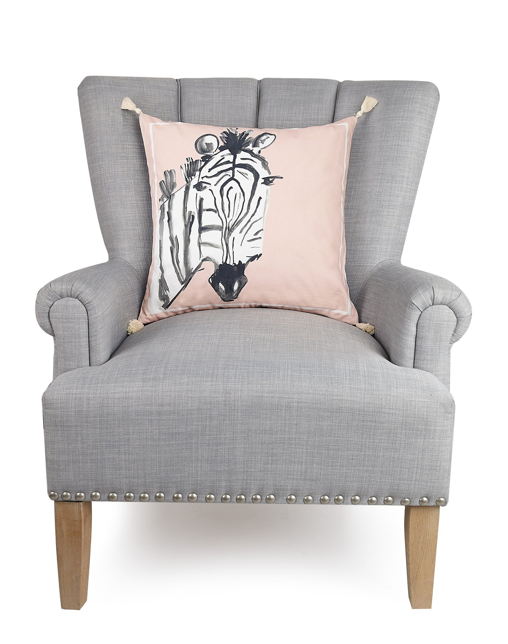 Zebra Embroidered Throw Pillow on an armchair, showing the throw pillow at room scale, 18x18 inch
