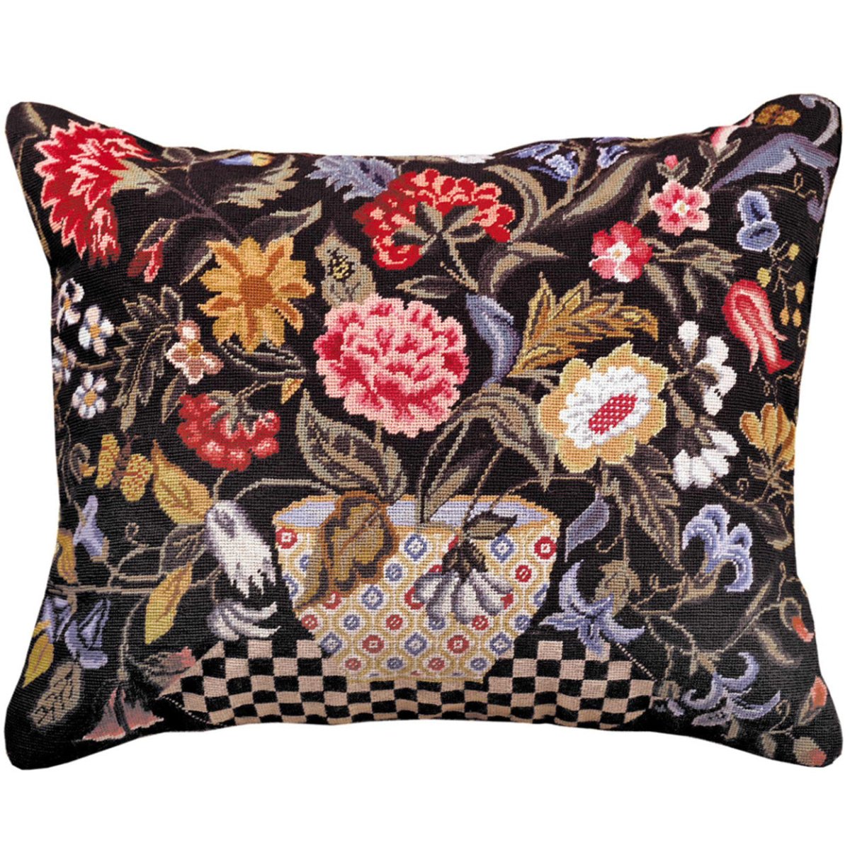 Hooked vs. needlepoint vs. embroidered pillows: a petit point needlepoint floral pillow showing the fully stitched wool surface