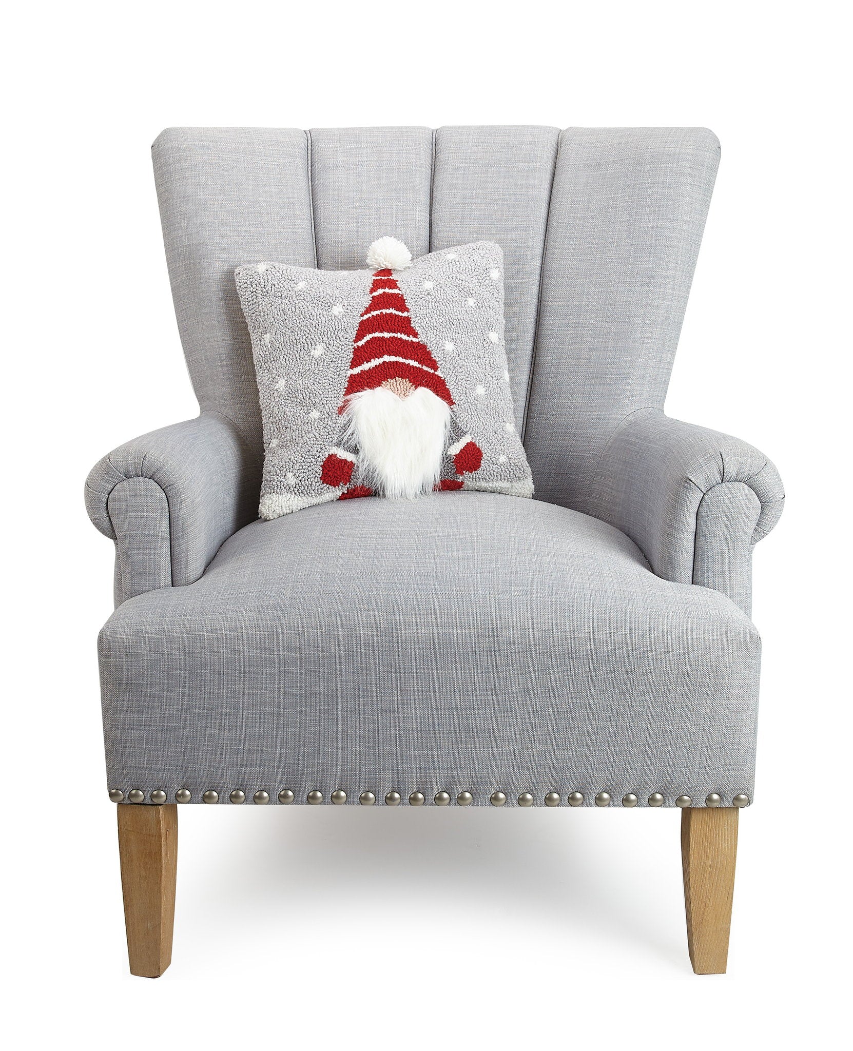 3D Gnome Hooked Wool Christmas Throw Pillow on an armchair, showing the throw pillow at room scale, 14x14 inch