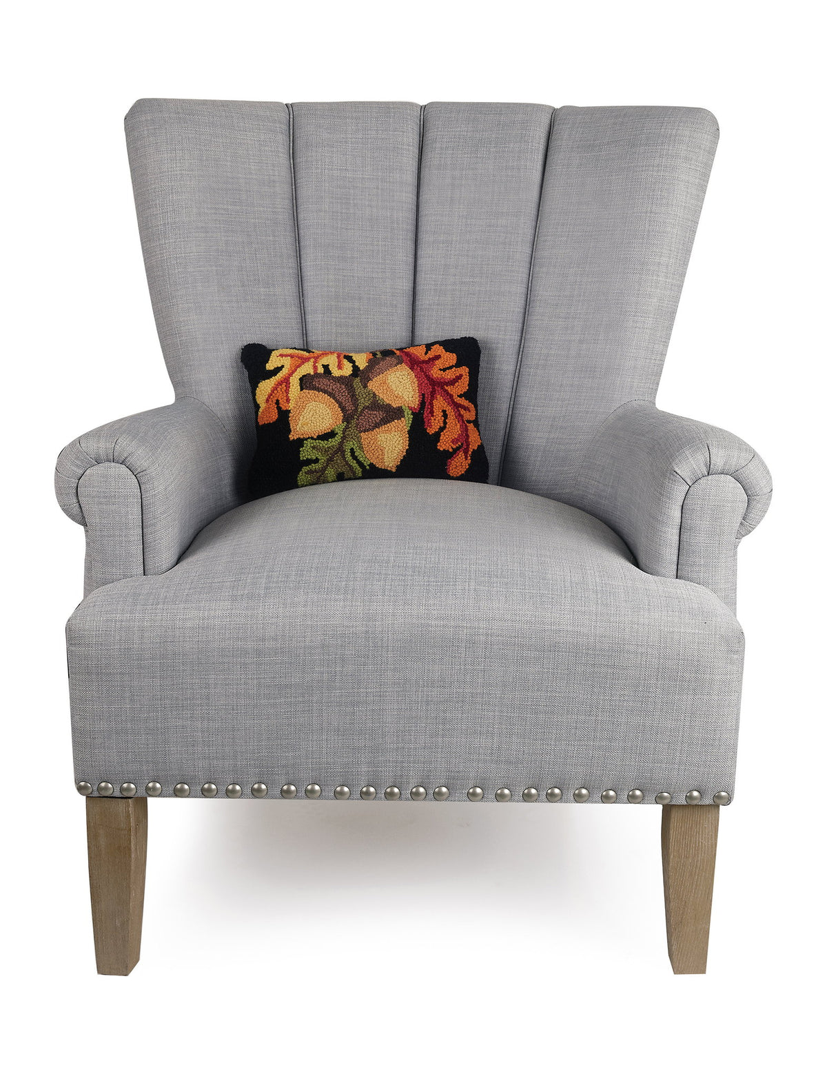 Acorn with Leaves Hooked Wool Fall Harvest Throw Pillow on an armchair, showing the throw pillow at room scale, 8x12 inch