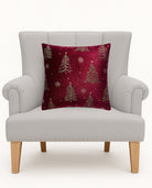 All Over Trees Velvet Embroidered Christmas Throw Pillow on an armchair, showing the throw pillow at room scale, 16x16 inch