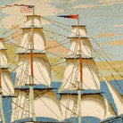 Closeup of America Tall Ship Coastal needlepoint throw pillow highlighting hand-stitched wool craftsmanship and fabric detail