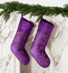 Amethyst Foliage Velvet Embroidered Christmas Stocking styled in a room setting, 12x20 inch