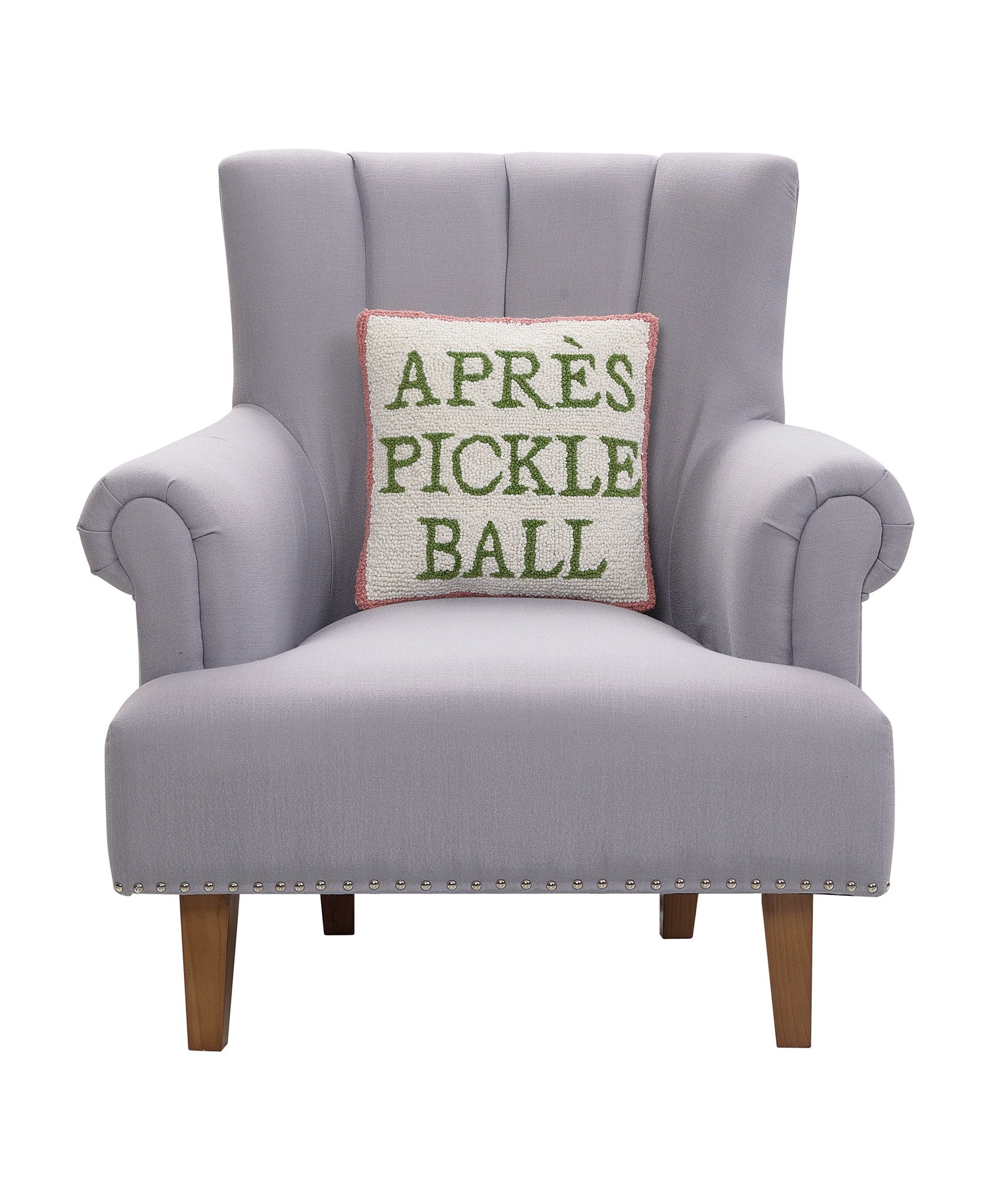 Apres Pickleball Hooked Wool Throw Pillow on an armchair, showing the throw pillow at room scale, 14x14 inch