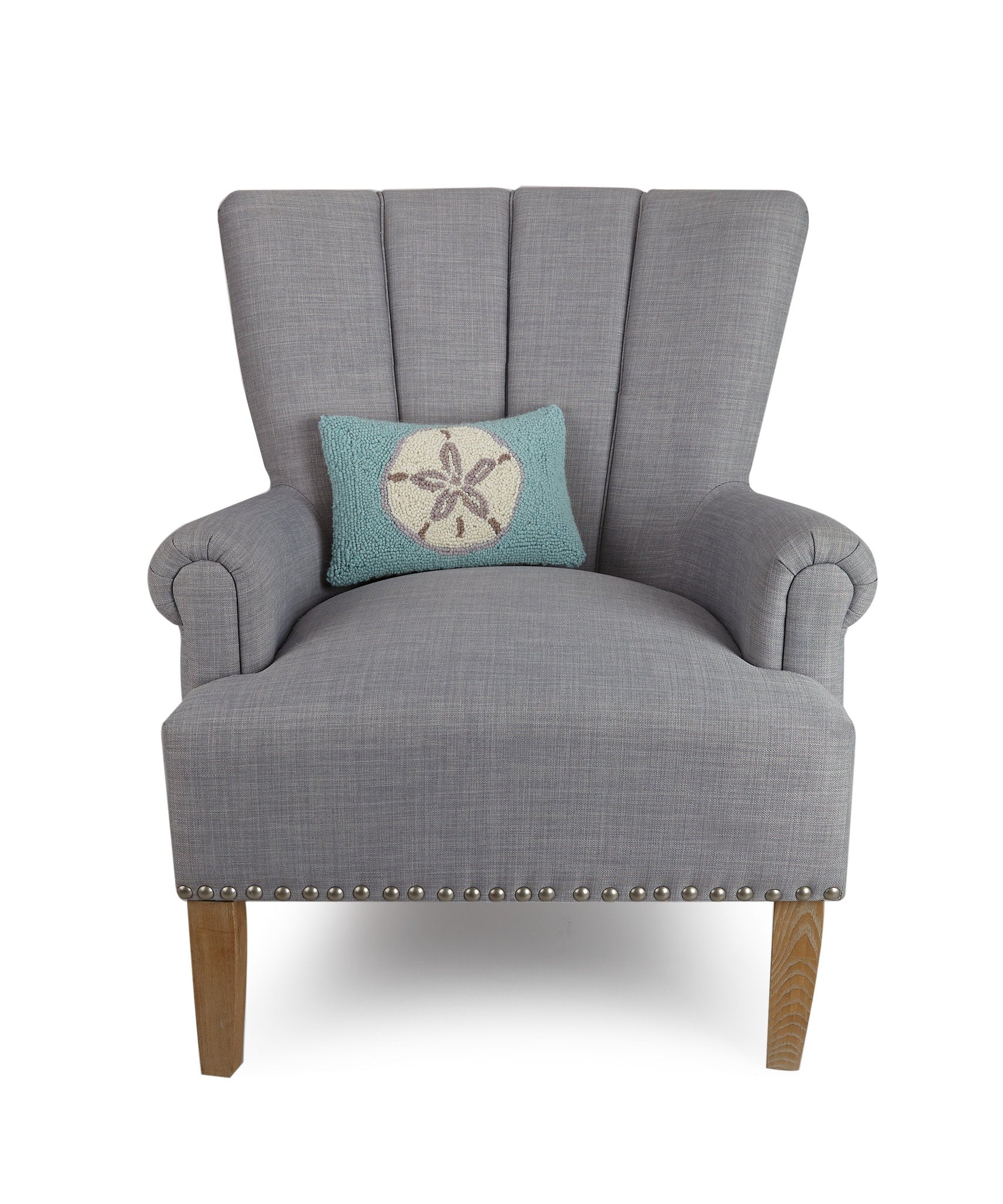 Aqua Ground Sand Dollar Hooked Wool Throw Pillow on an armchair, showing the throw pillow at room scale, 8x12 inch