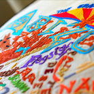 Arizona State Desert Travel Embroidered Throw Pillow - close-up detail of hand-embroidered needlepoint stitching