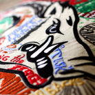 Arkansas Razorbacks Embroidered College Pillow - close-up detail of hand-embroidered needlepoint stitching