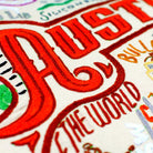 Austin, TX Live Music City Embroidered Travel Pillow - close-up detail of hand-embroidered needlepoint stitching