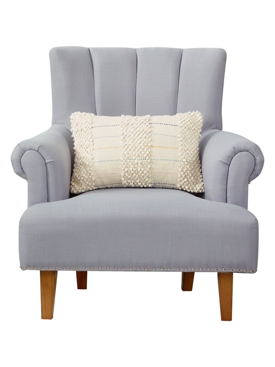 Baubles Embroidered Throw Pillow on an armchair, showing the throw pillow at room scale, 12x20 inch