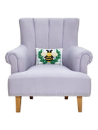 Bee Wreath Hooked Wool Throw Pillow on an armchair, showing the throw pillow at room scale, 8x12 inch