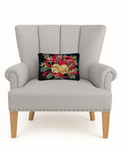 Bells & Ribbon with Foliage Hooked Wool Christmas Throw Pillow on an armchair, showing the throw pillow at room scale, 8x12 inch