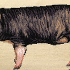Closeup of Black Berkshire Pig needlepoint throw pillow highlighting hand-stitched wool craftsmanship and fabric detail