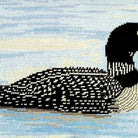 Hand-stitched wool detail of Black Loon Rustic Wildlife Lodge needlepoint pillow showing intricate weave pattern and texture