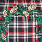 Closeup of Black Plaid Wreath Embroidered Christmas Throw Pillow showing stitch texture and craftsmanship detail