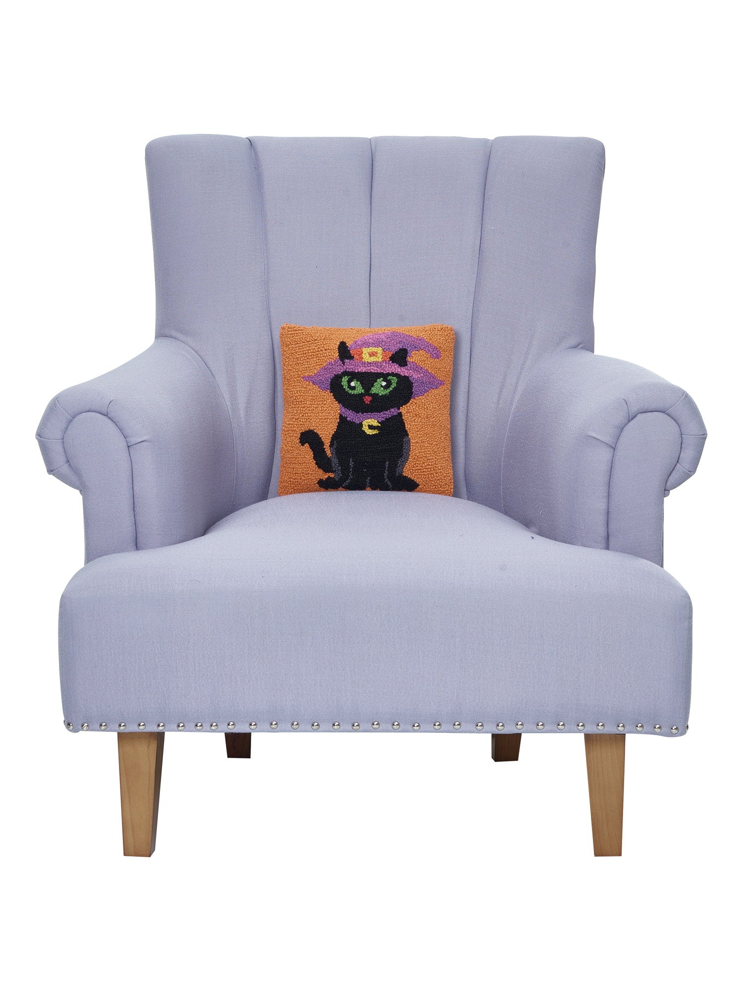 Black Witch Cat Hooked Wool Halloween Throw Pillow on an armchair, showing the throw pillow at room scale, 10x10 inch