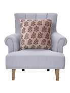 Block Print Velvet Lilac Flower Throw Pillow on an armchair, showing the throw pillow at room scale, 20x20 inch