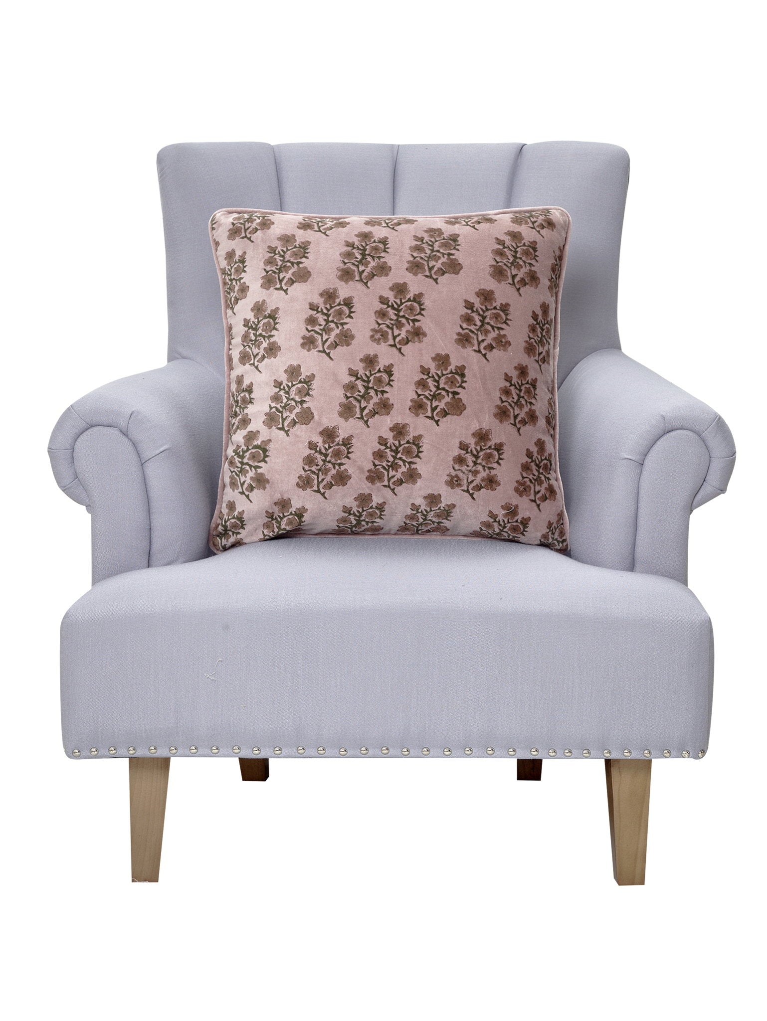 Block Print Velvet Lilac Flower Throw Pillow on an armchair, showing the throw pillow at room scale, 20x20 inch