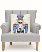 Blue Gold Chinoiserie Nutcracker Hooked Wool Christmas Throw Pillow on an armchair, showing the throw pillow at room scale, 18x18 inch
