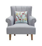 Blue Stripe Floral Embroidered Throw Pillow on an armchair, showing the throw pillow at room scale, 16x16 inch