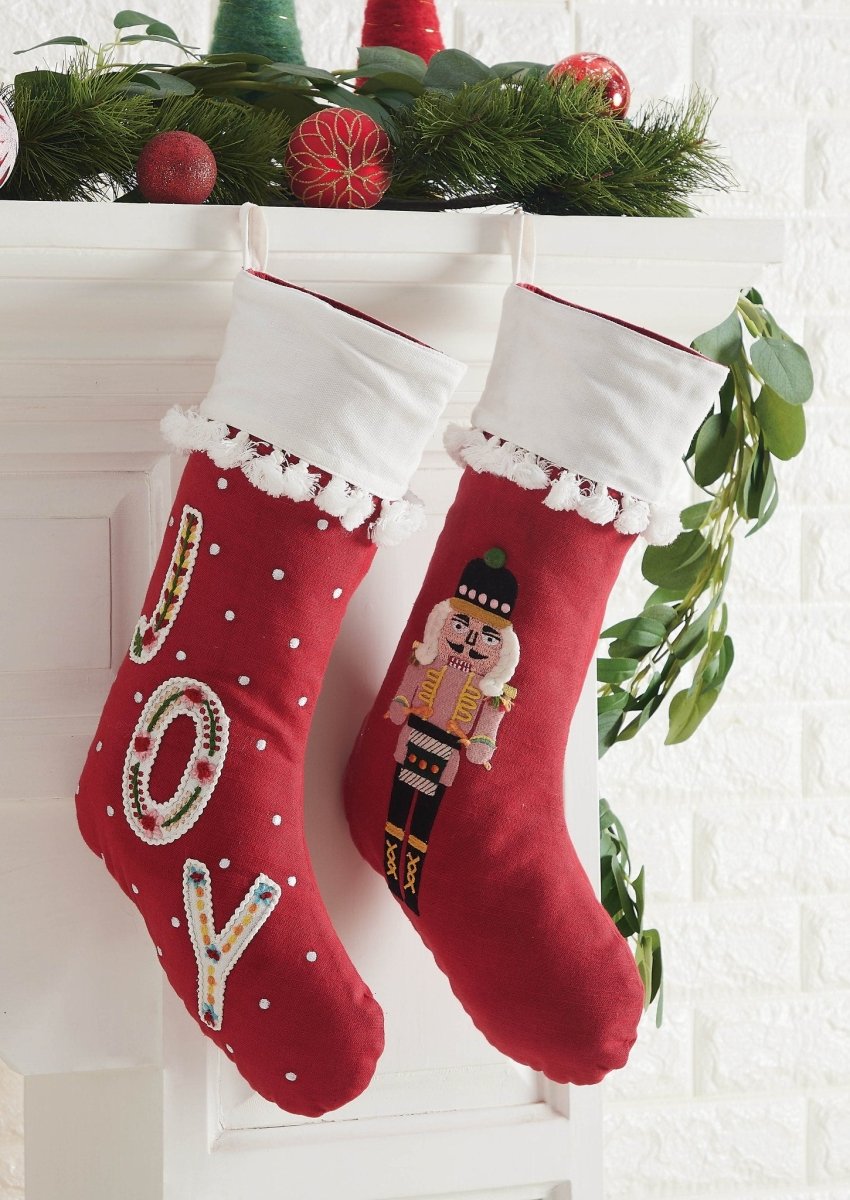 Boho Joy Embroidered Christmas Stocking shown alongside other designs in the same collection, 11x19 inch