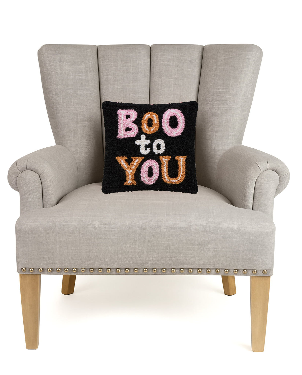 Boo to You Hooked Wool Halloween Throw Pillow on an armchair, showing the throw pillow at room scale, 10x10 inch