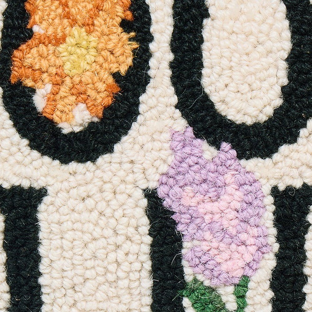 Closeup of Book Club Hooked Wool Throw Pillow showing stitch texture and craftsmanship detail