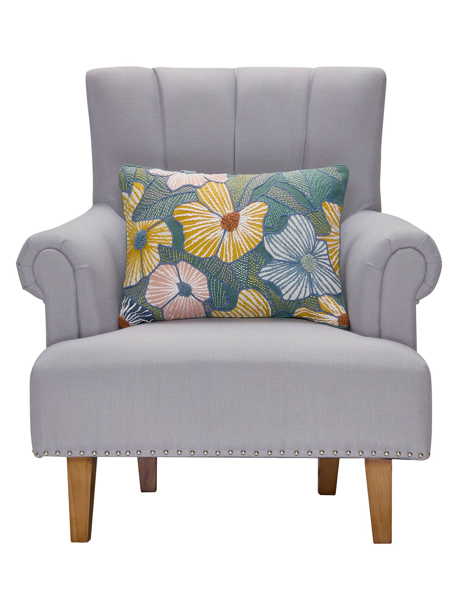 Bright Flowers Embroidered Throw Pillow on an armchair, showing the throw pillow at room scale, 14x20 inch
