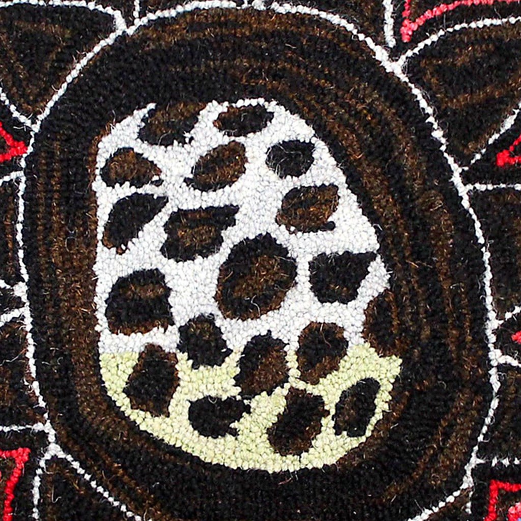 Closeup of Brown Abstract Botanical Wool Hooked needlepoint throw pillow highlighting hand-stitched wool craftsmanship and fabric detail